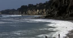 Malibu kayaker reportedly bitten by shark twice, knocked into water