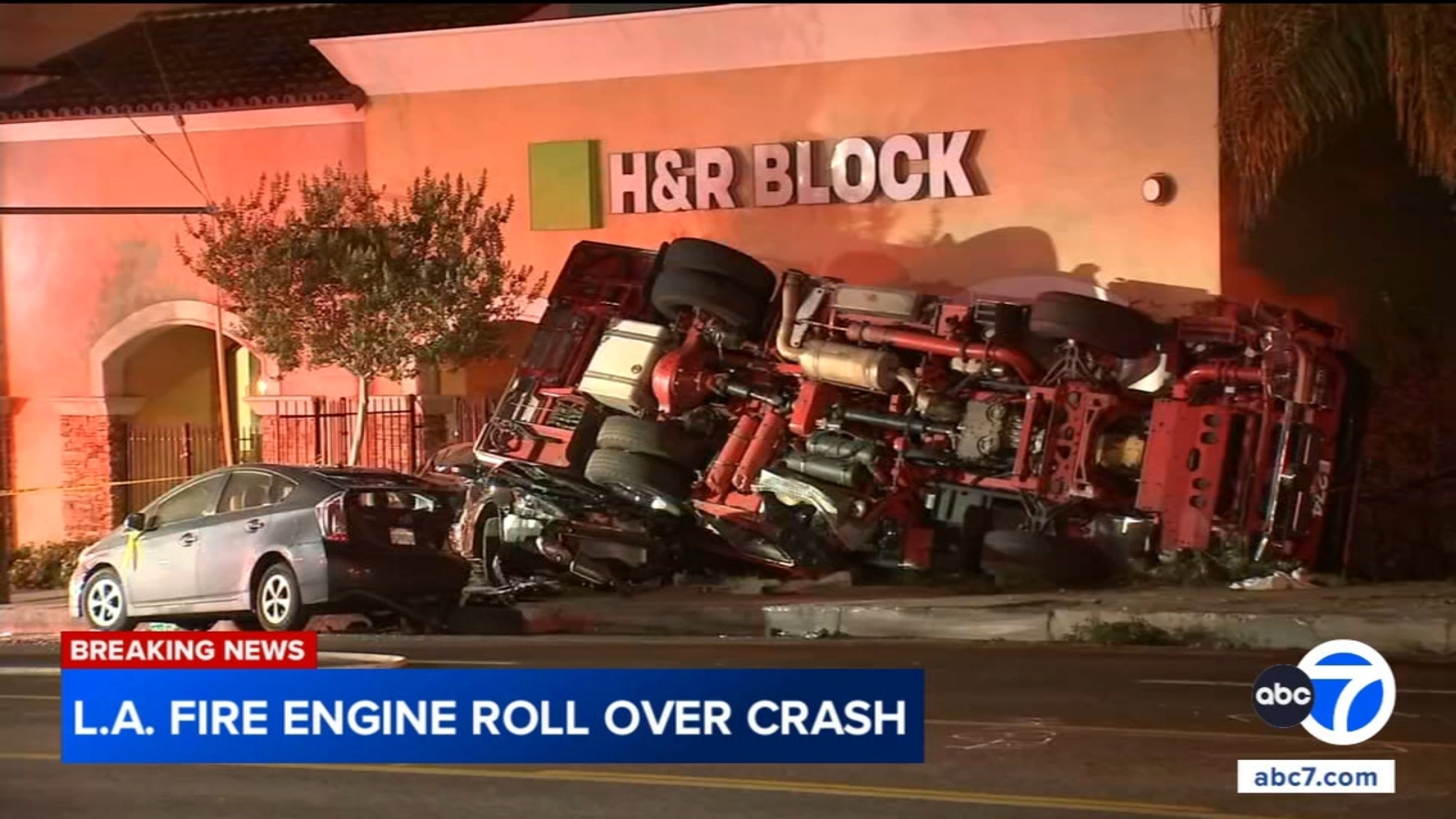 2 LAFD firefighters injured after fire truck overturns in crash caught on video