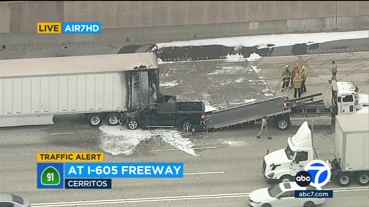 Pickup truck slams into stalled big rig on EB 91 Freeway in Cerritos; fiery crash snarls commute