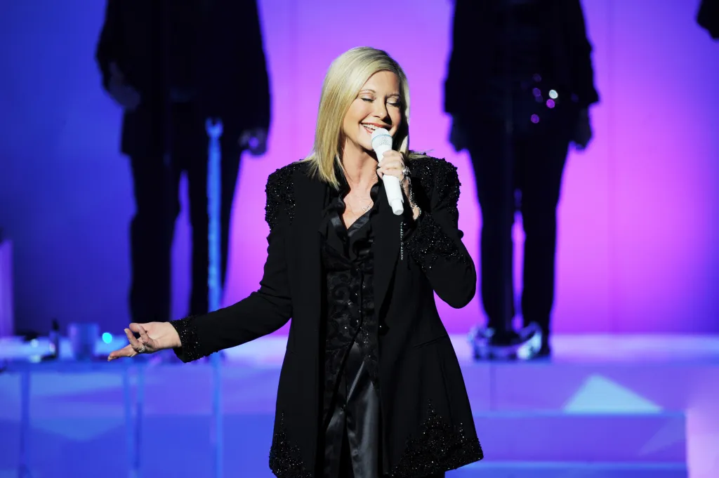 Olivia Newton-John is the one that you want to see in Cerritos